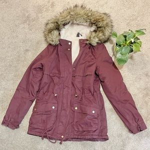 Winter coat with faux fur hood